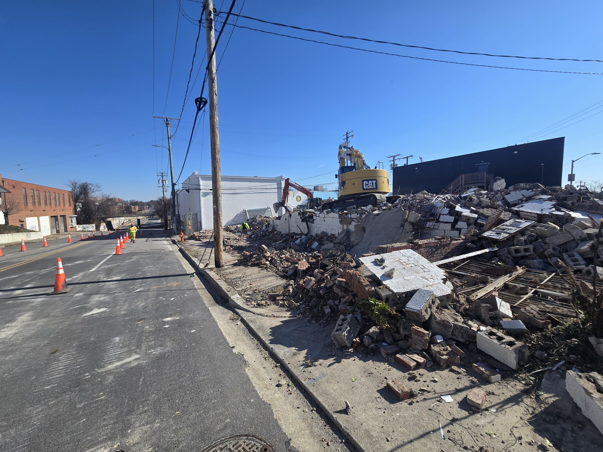 Commercial building demolition debris along a city street in Annapolis, MD