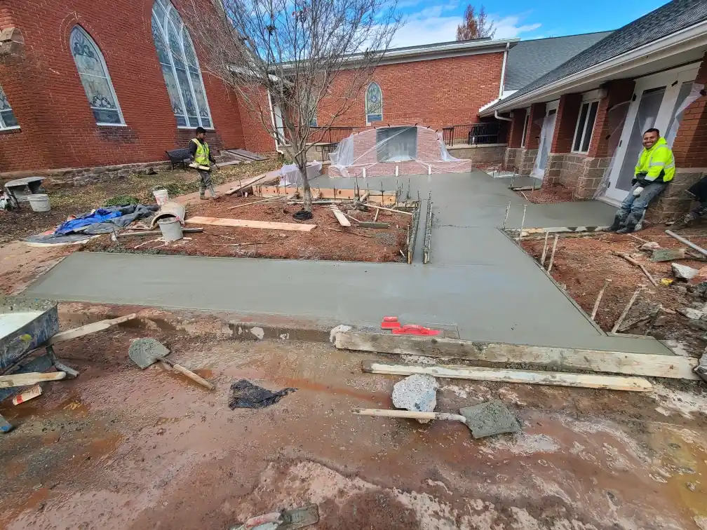 Crew in high-visibility safety gear on a protected job site in Frederick, MD