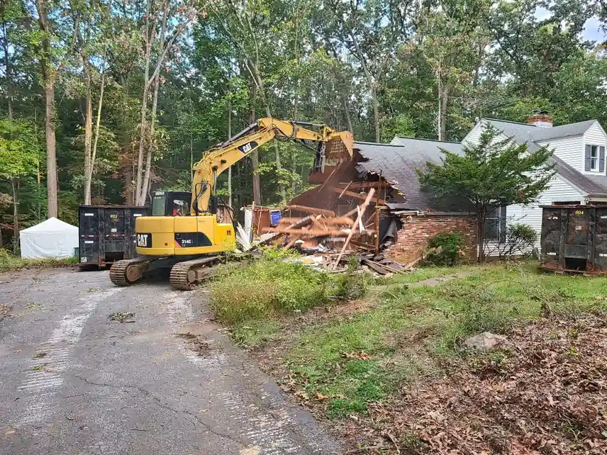 Teardown of an older home on a residential lot in Frederick, MD