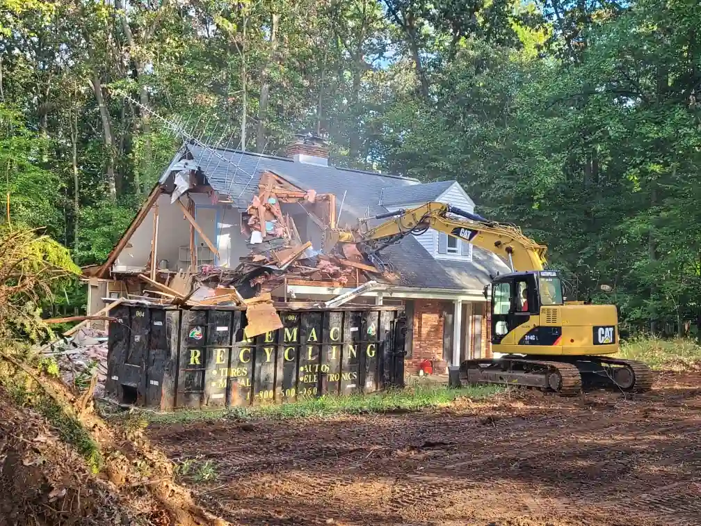 Excavator working a wooded lot in Frederick, MD