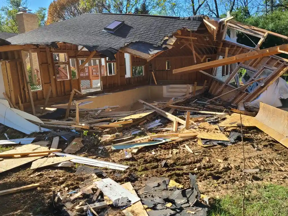 House framing and debris during a residential teardown in Frederick, MD